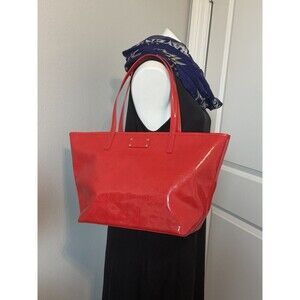 Kate Spade New York Red Patent PVC Tote Bag Perforated Spade Zip Top
